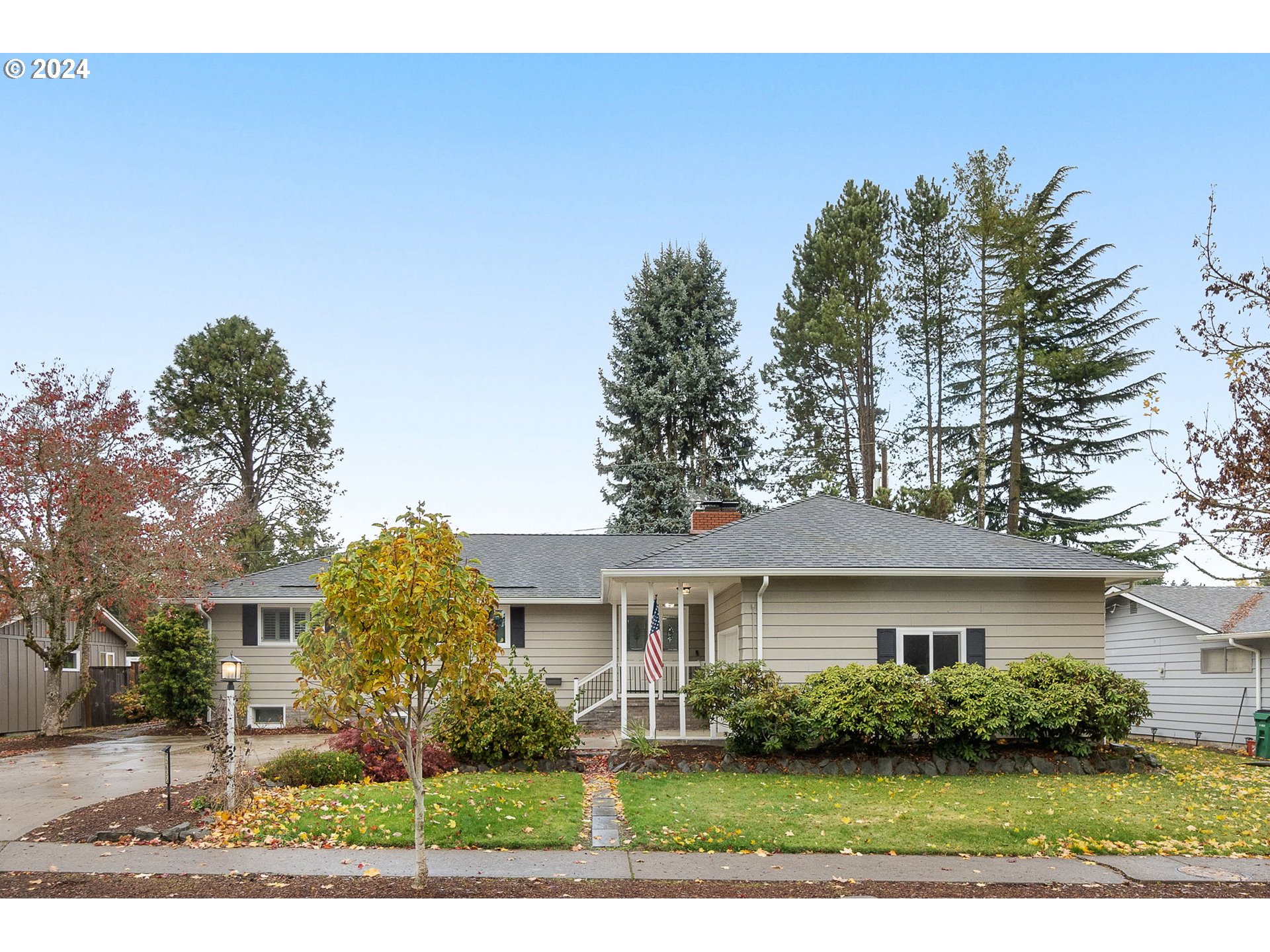 front view of a house with a yard