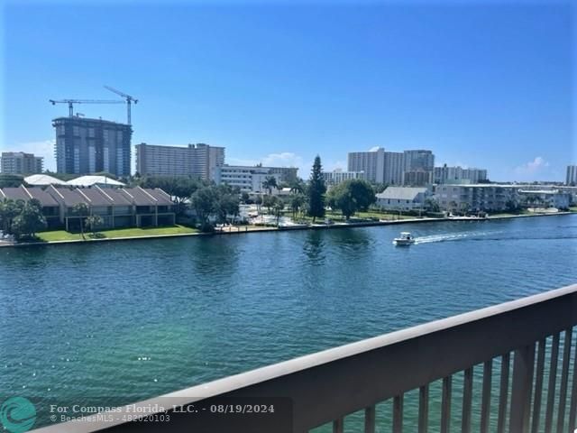 a view of a lake with a city view