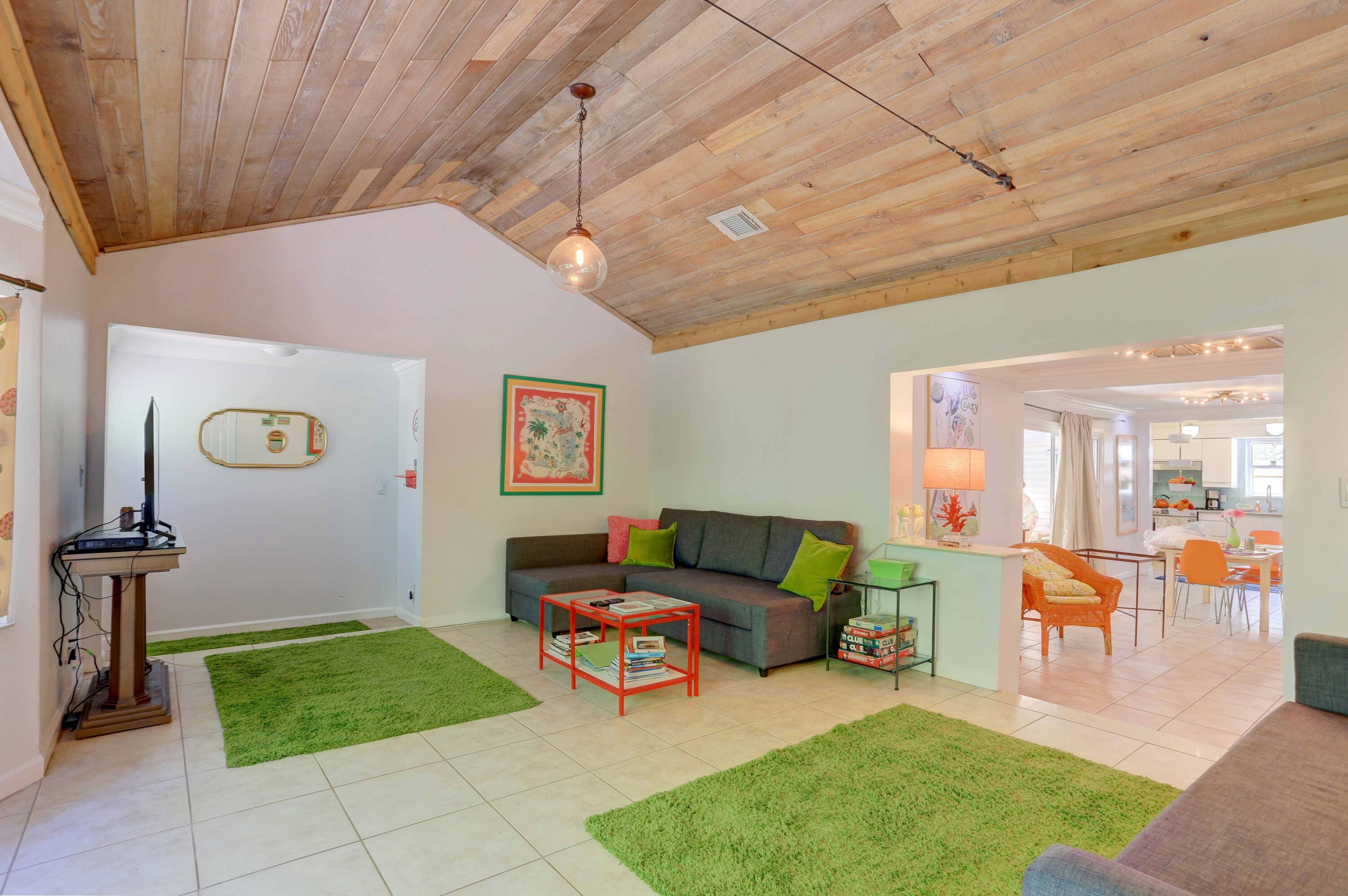 a living room with furniture and a table