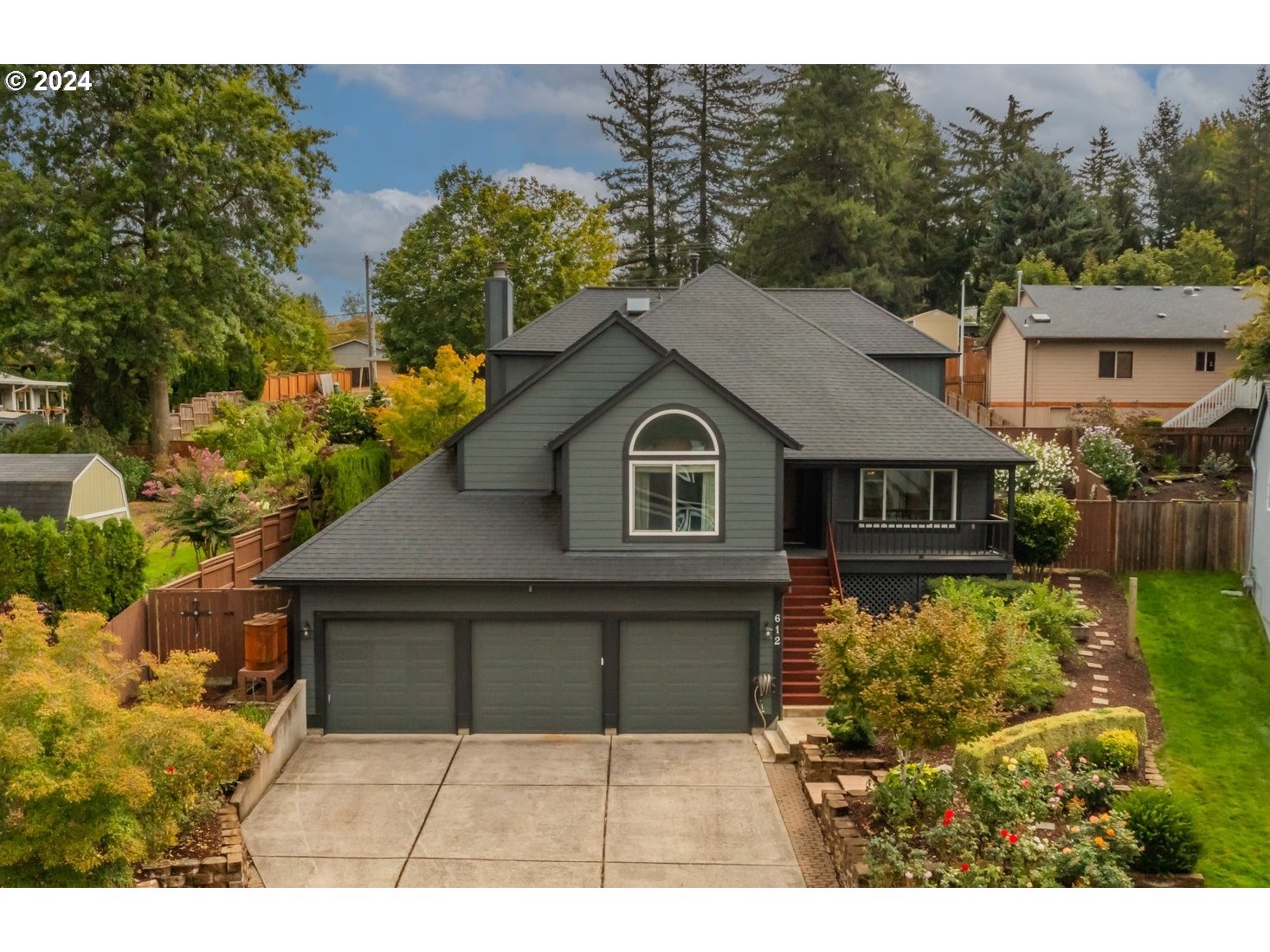 a house view with a garden space