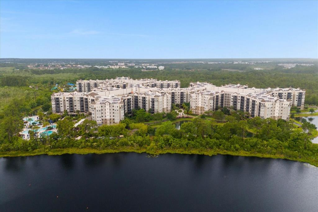 a view of a lake with a city