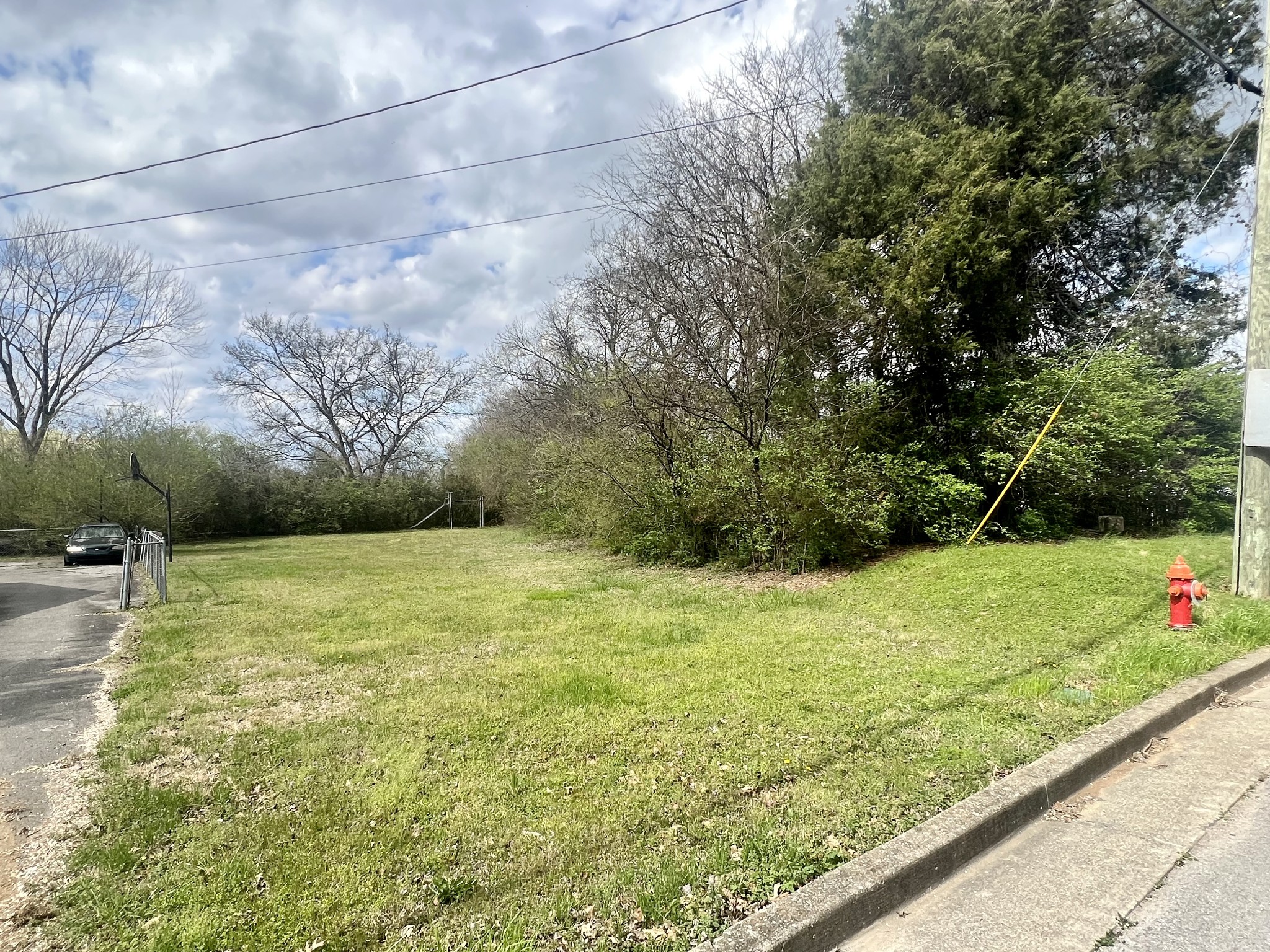 a view of a yard with an outdoor seating