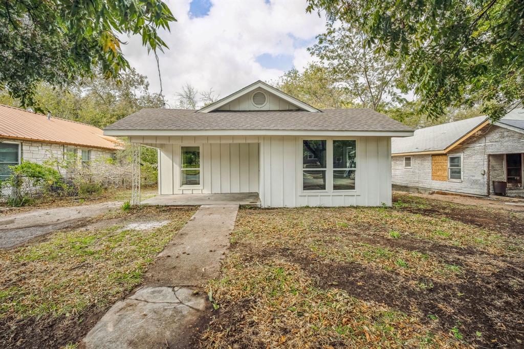 front view of a house and a yard