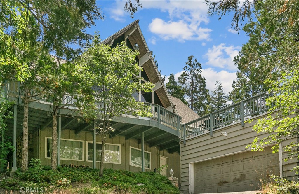 an outdoor view of house with green space