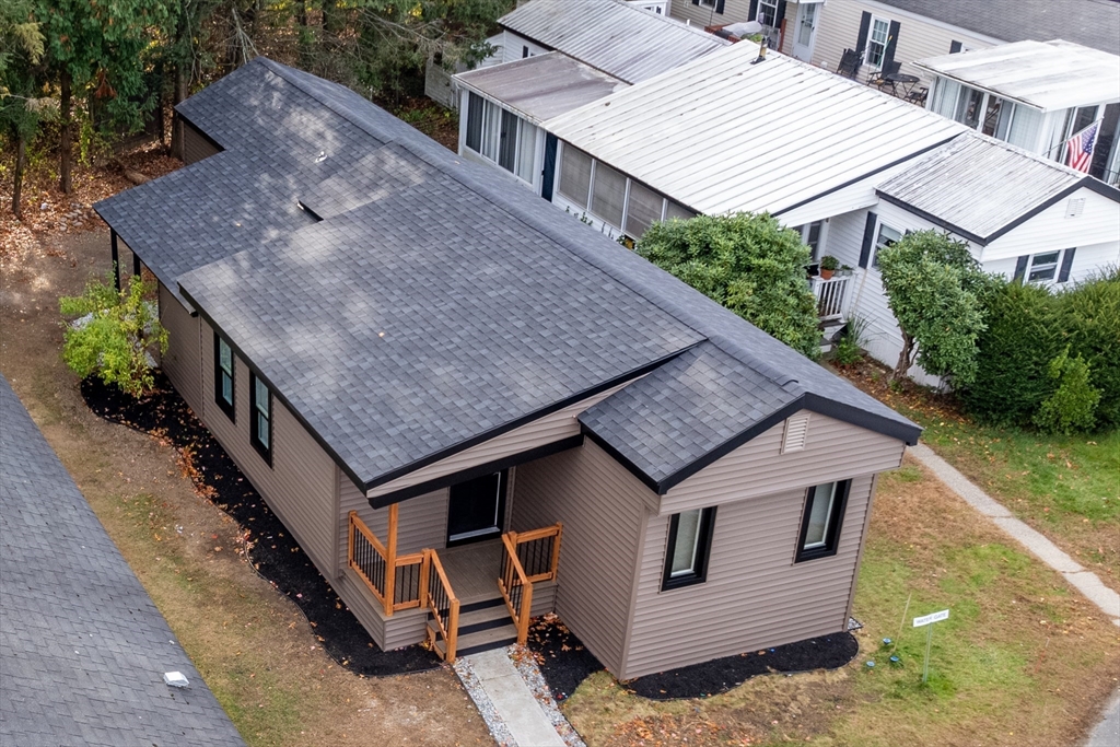 an aerial view of a house with balcony