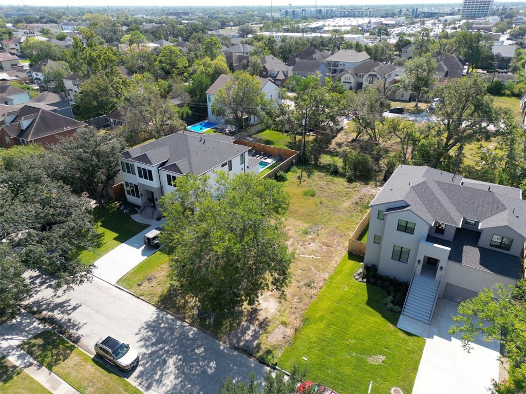 an aerial view of a house with a garden