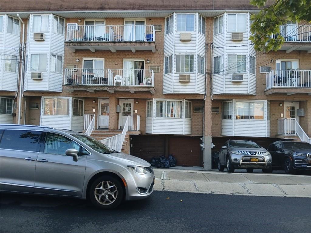 a car parked in front of a building