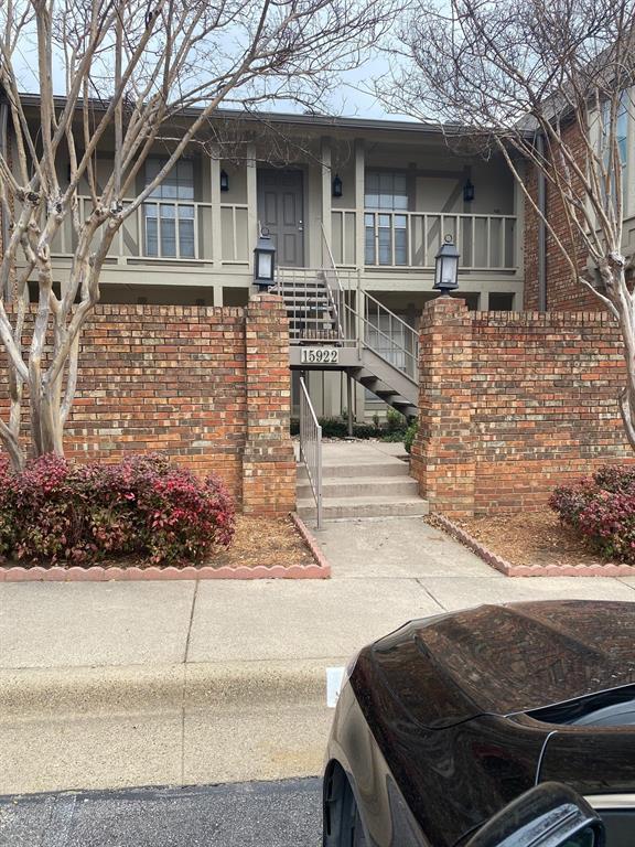 a front view of a house with garage