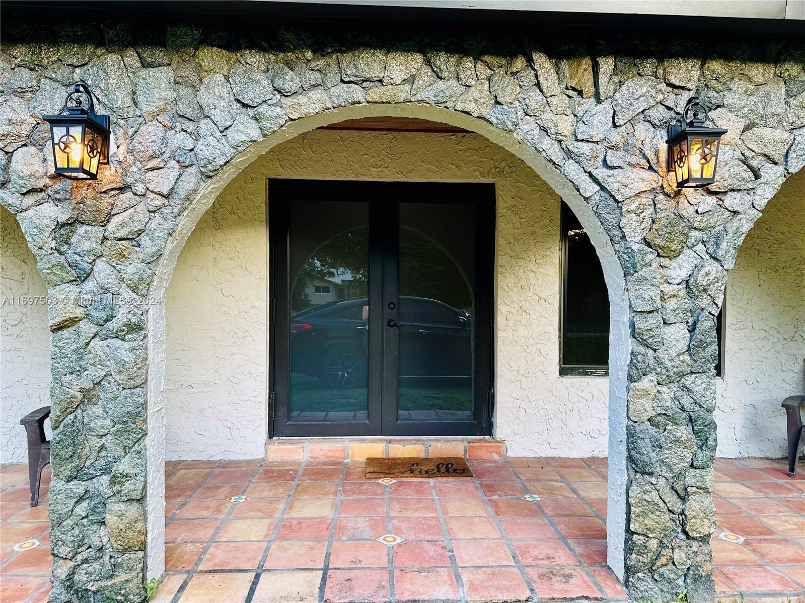 a front view of a house with a pathway