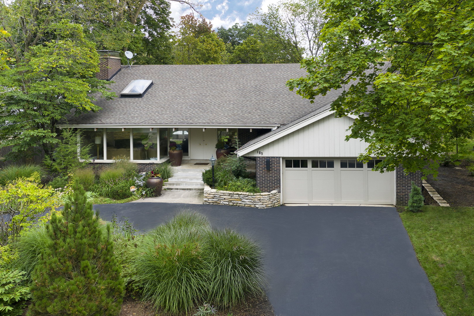 a house that has a lot of plants in it