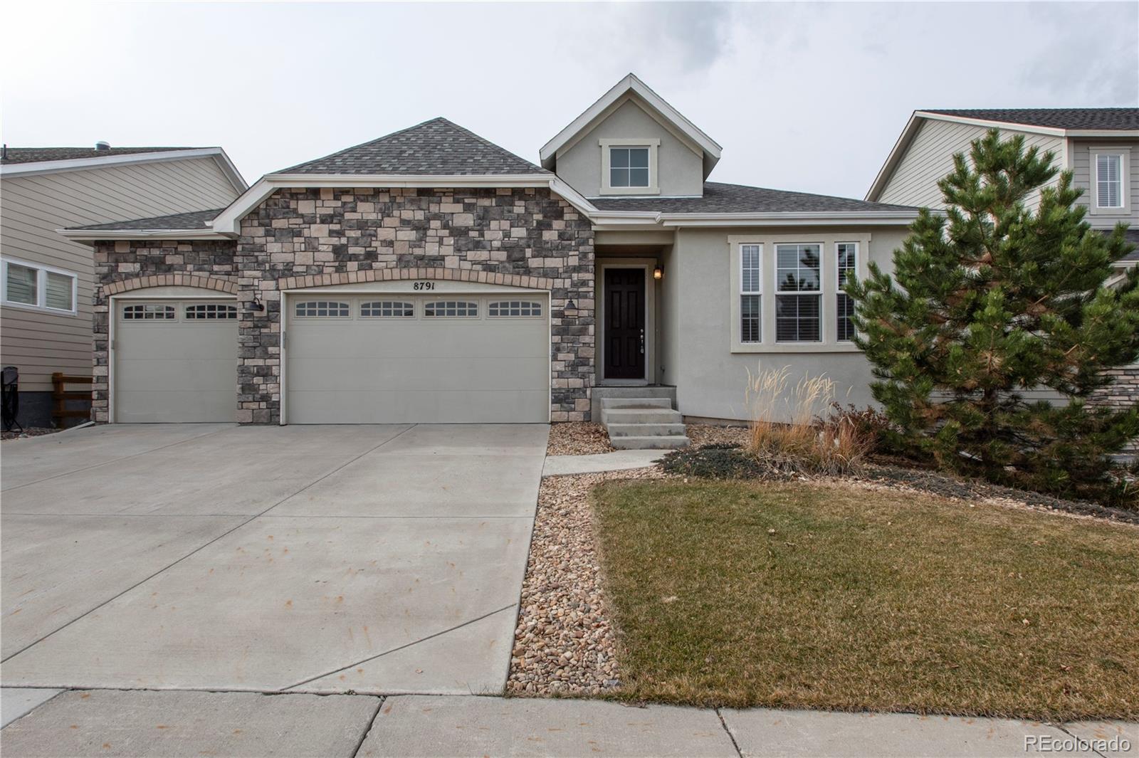 a front view of a house with yard