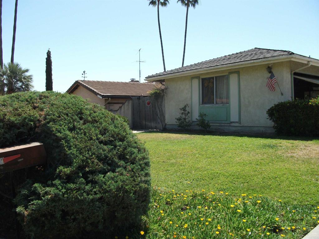 a house view with a outdoor space