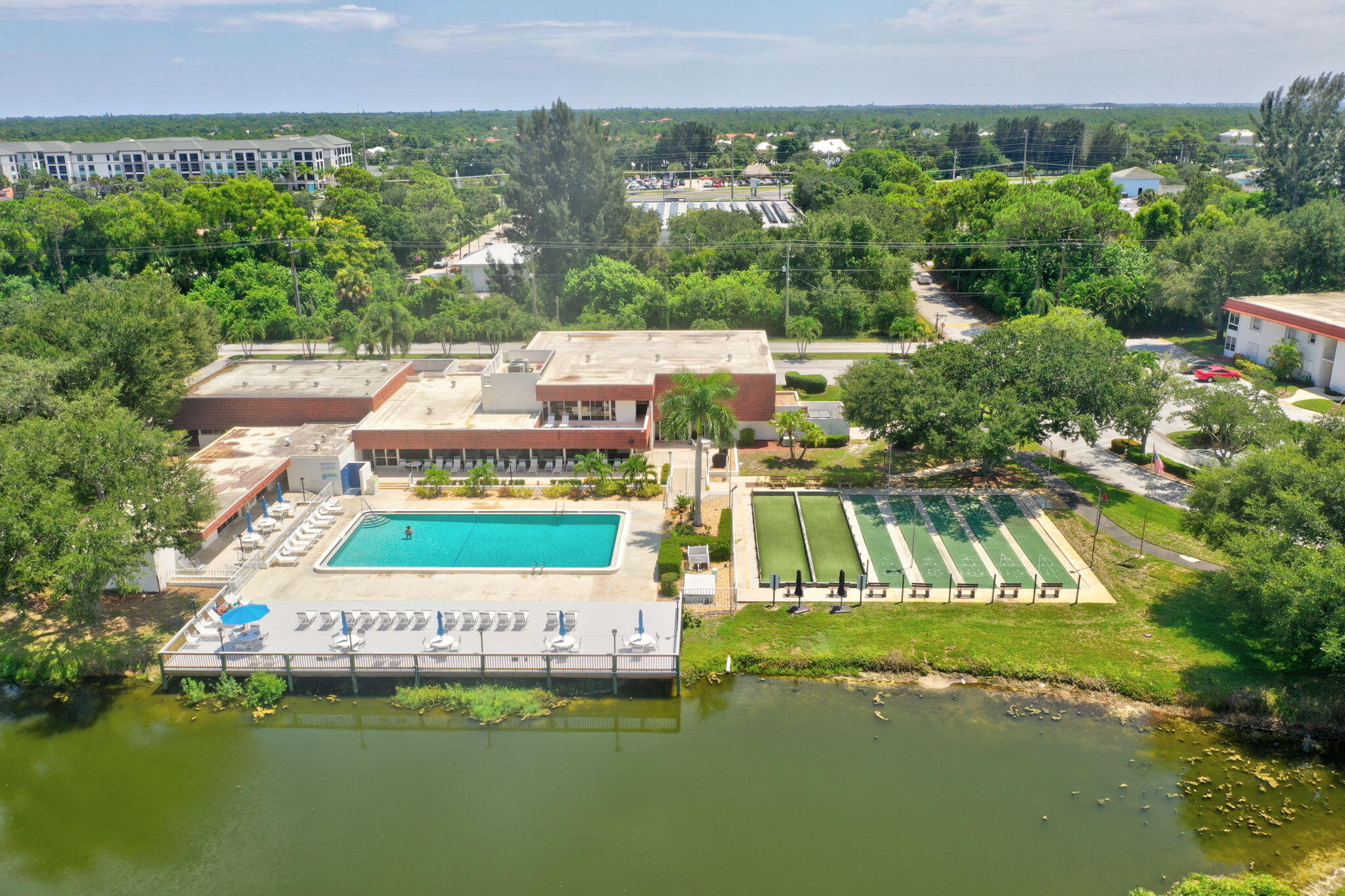 a view of swimming pool with a garden