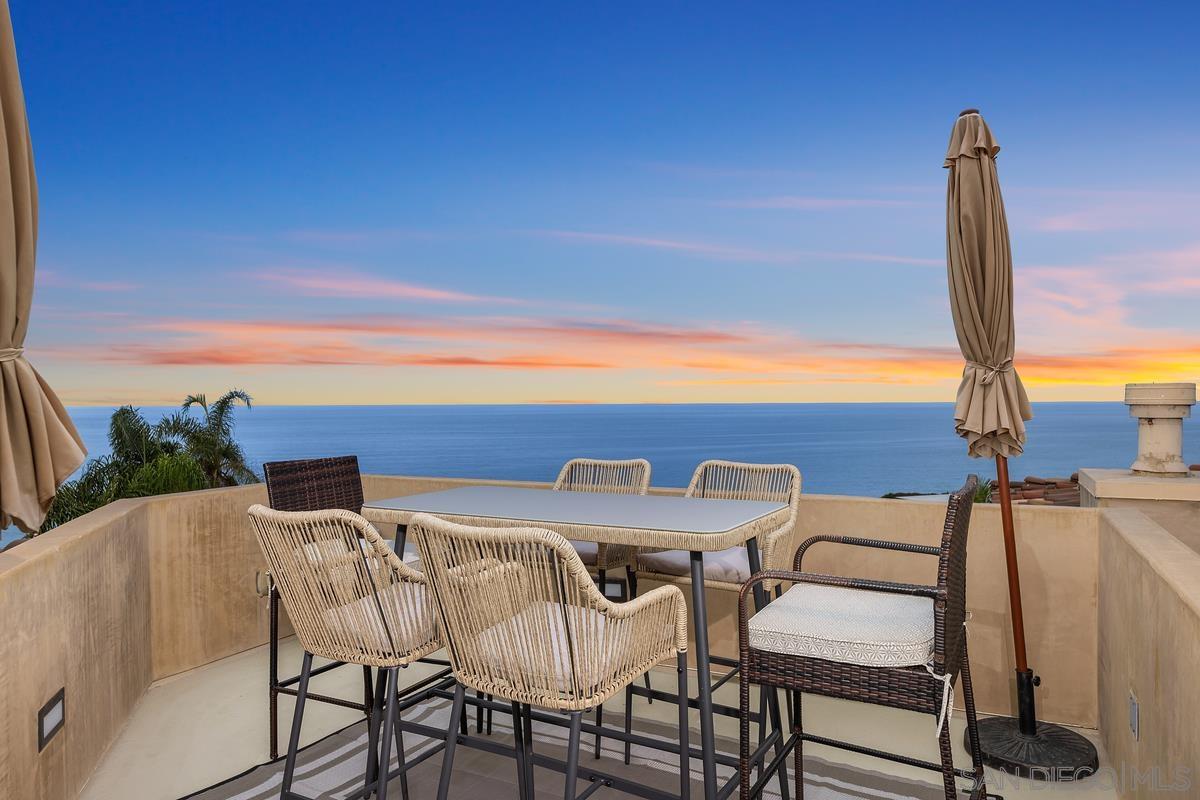 a view of a terrace with furniture and stove