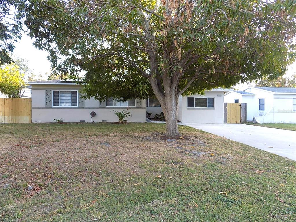 a house with trees in front of it