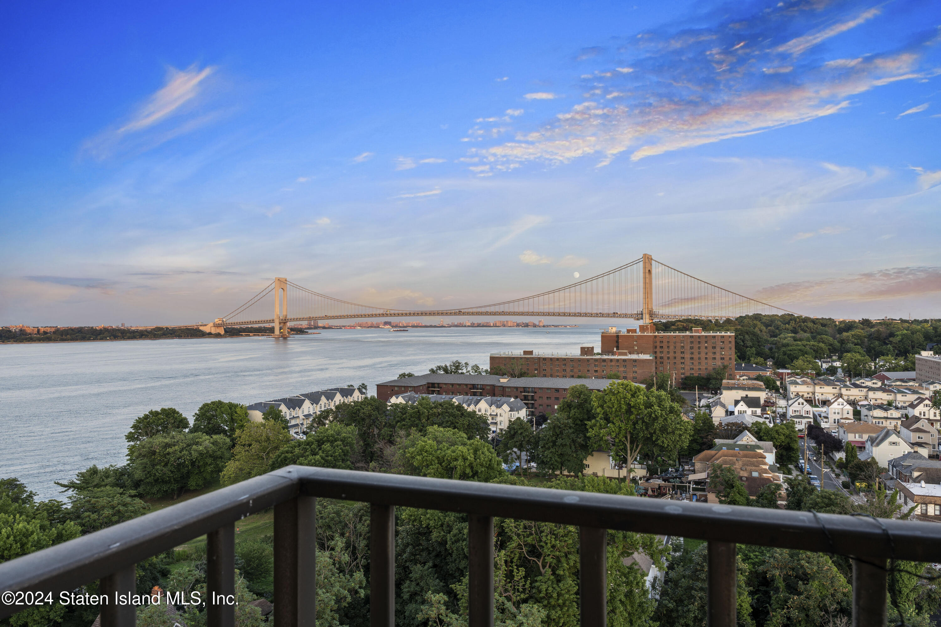 a view of a city skyline from a balcony