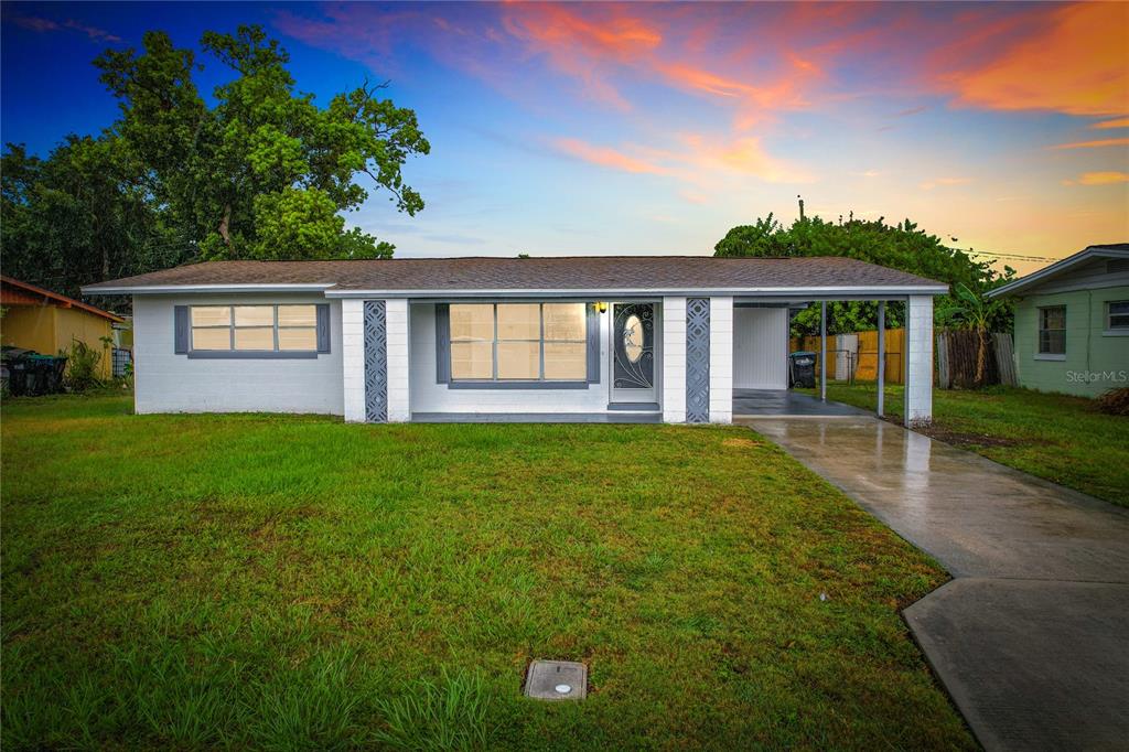 front view of house with a yard