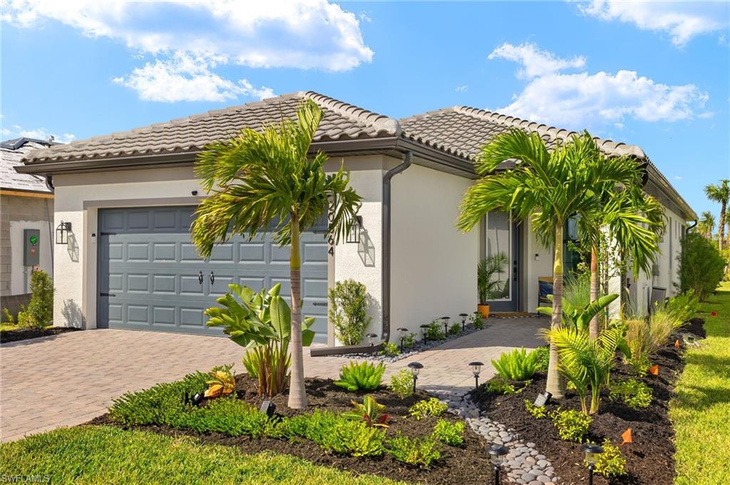 View of front of home with a garage