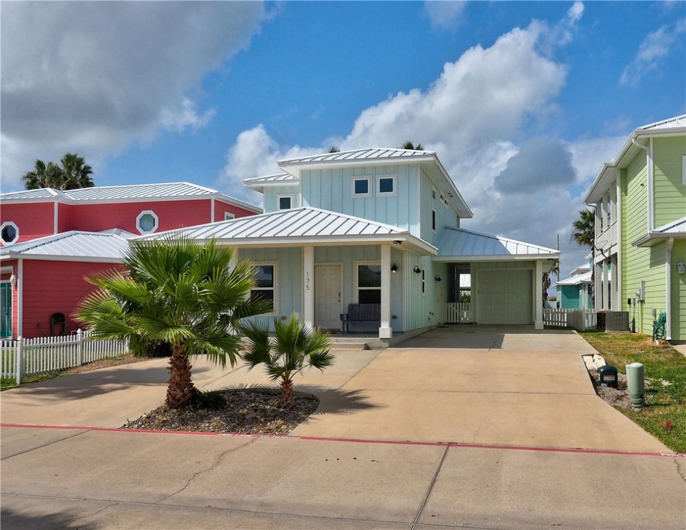 a front view of a house with yard