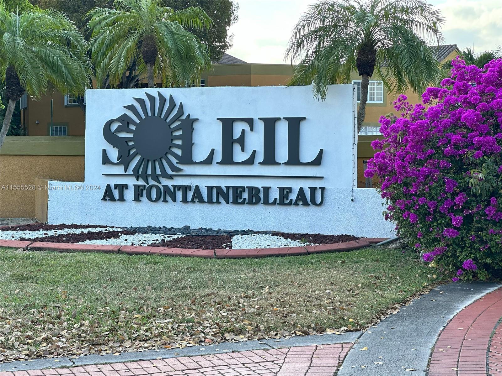 a view of sign board and yard