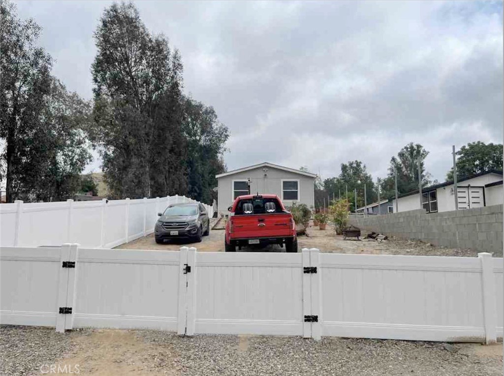 a view of backyard with dishwasher and stove