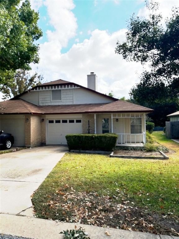 a front view of house with yard and entertaining space