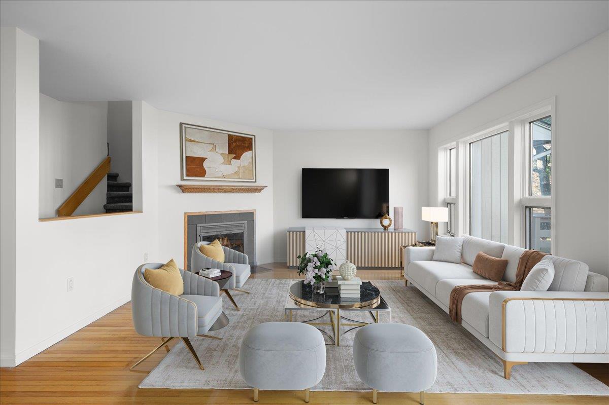 Living room with light wood-type flooring