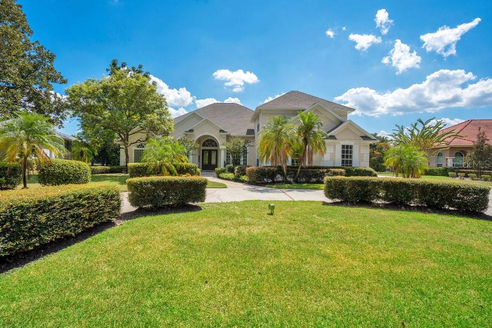 a view of a house with a big yard