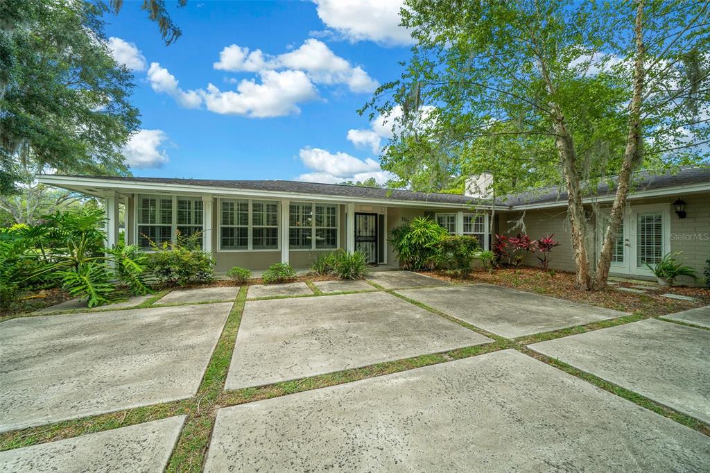 front view of a house with a patio