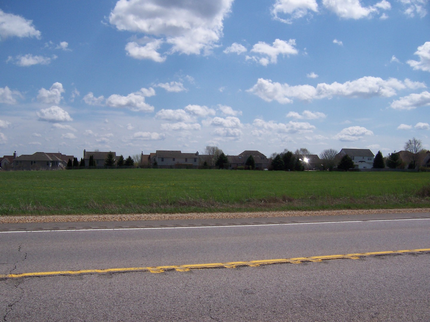 a view of a houses with a yard