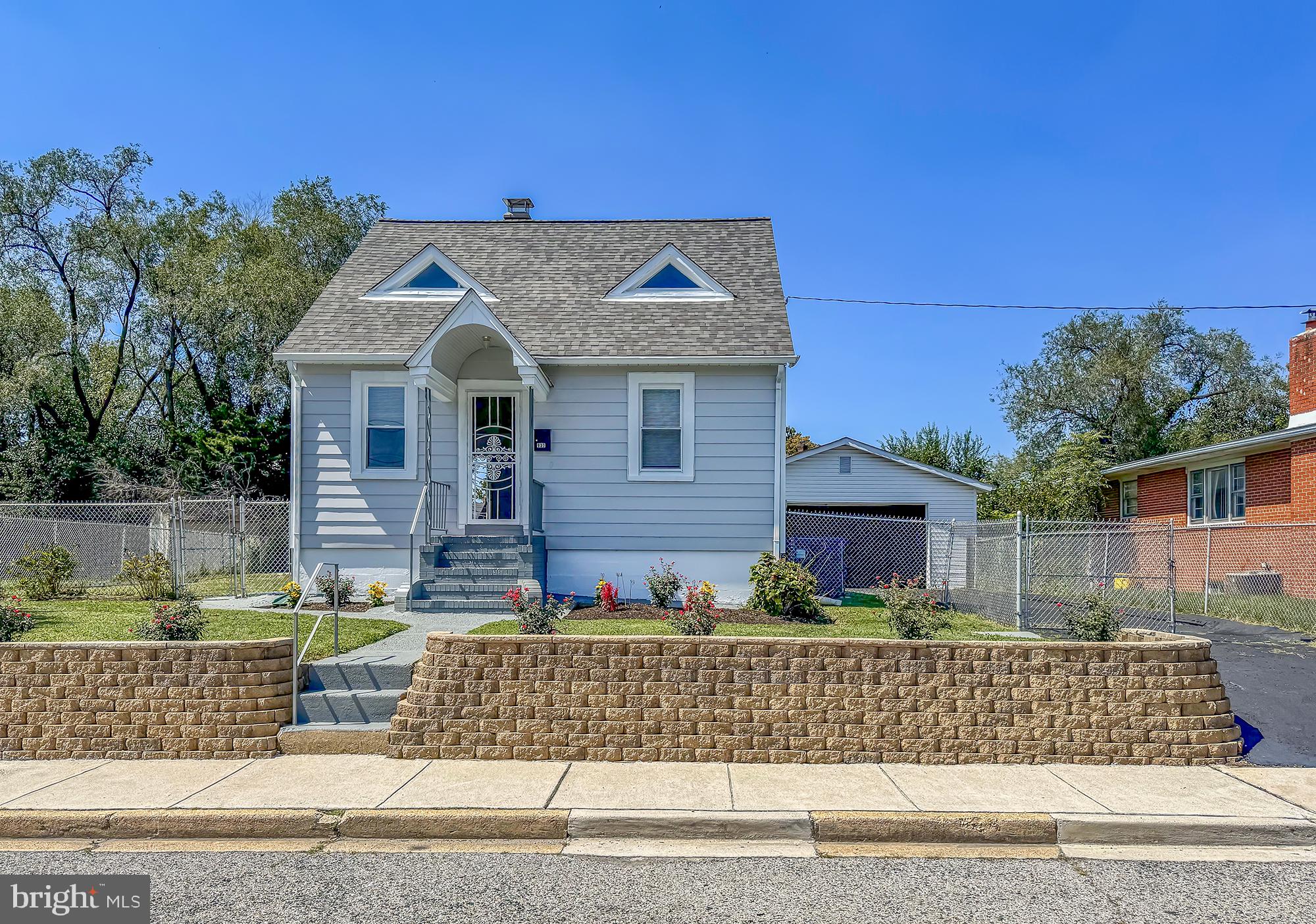 front view of a house with a street