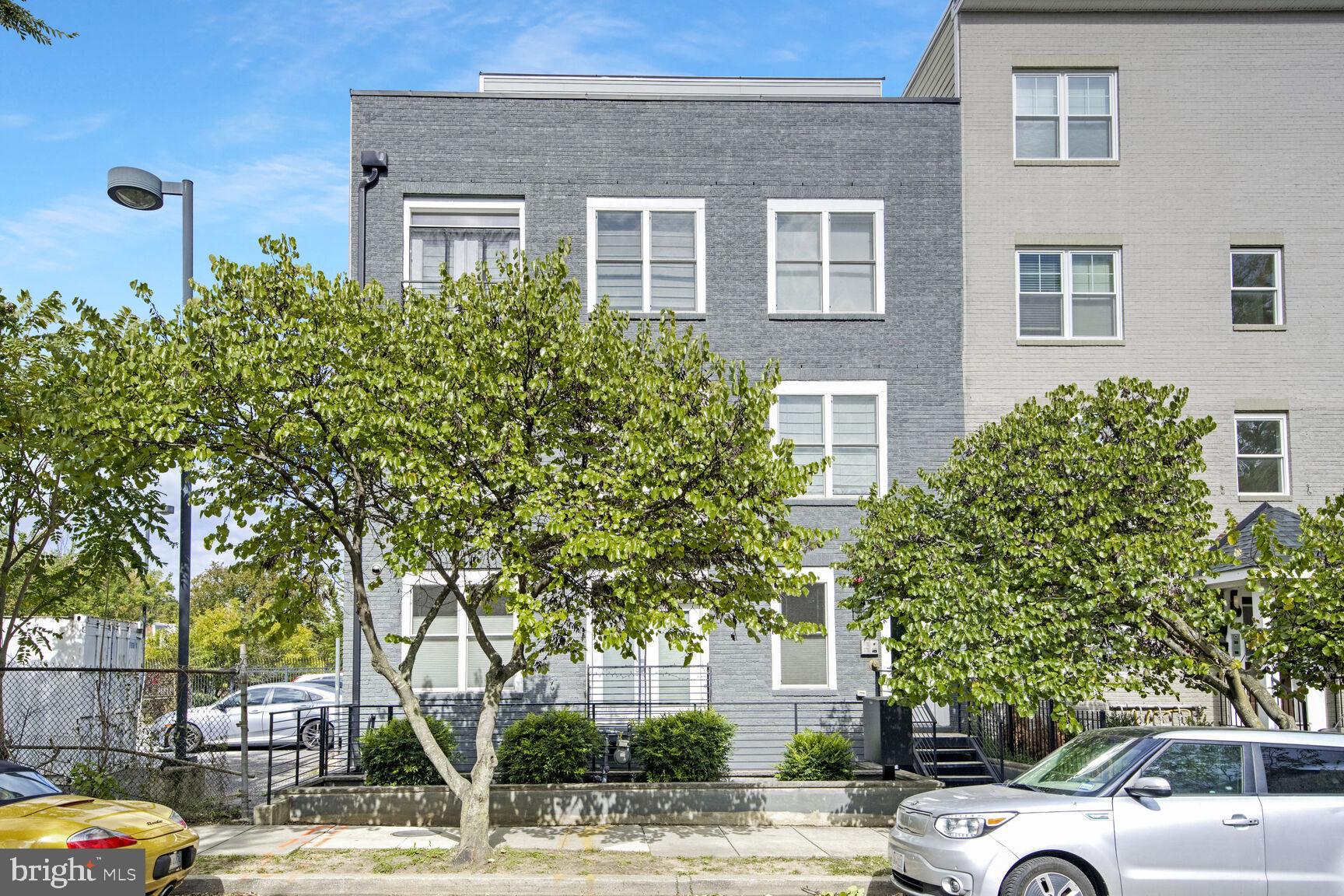 a view of a car parked in front of a building