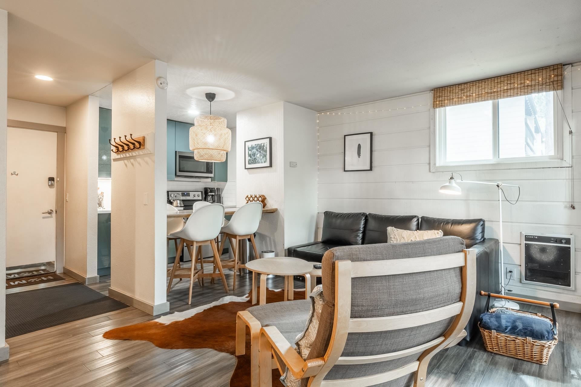 a view of kitchen and dining room with wooden floor