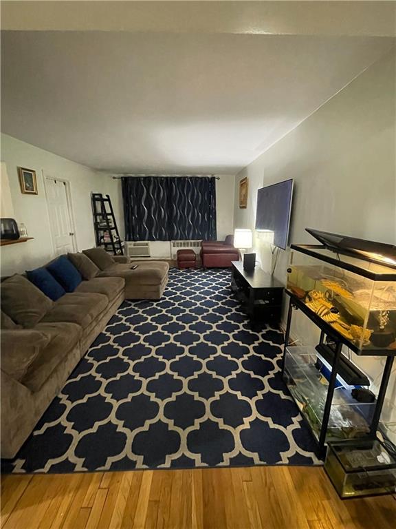 a living room with a black white checkered floor