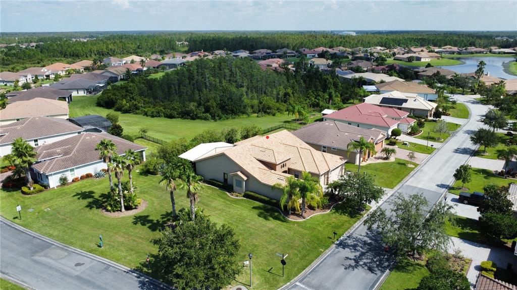 an aerial view of a house with a garden