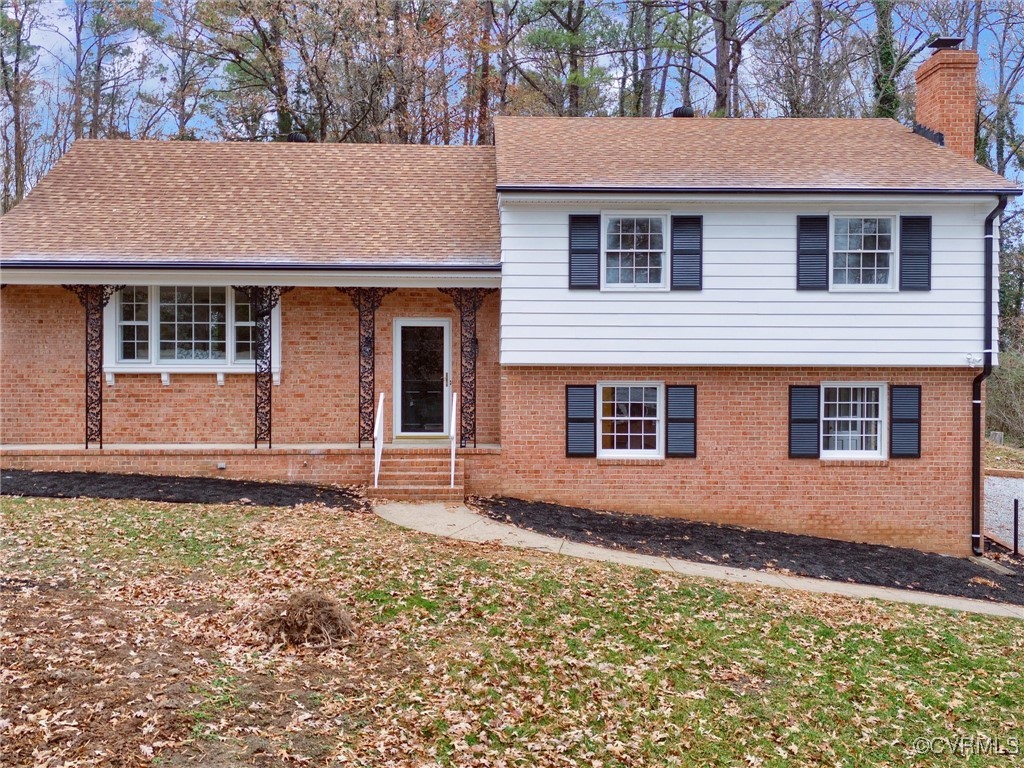 Front view of home with black trim.