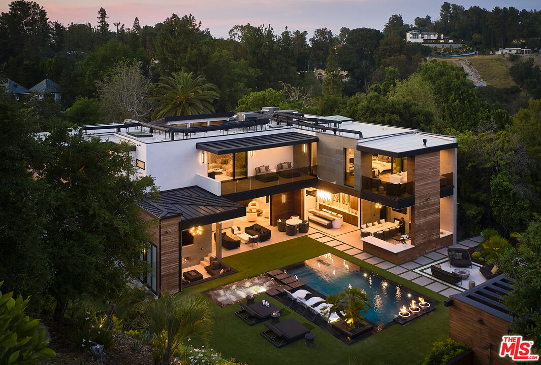 an aerial view of a house with a garden