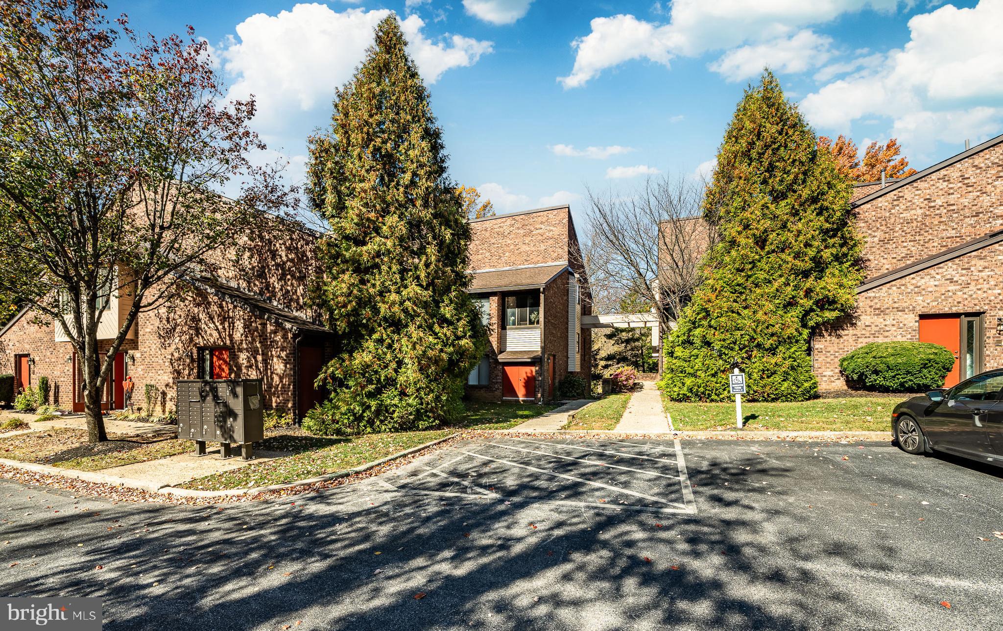 a view of a house with a yard and garage