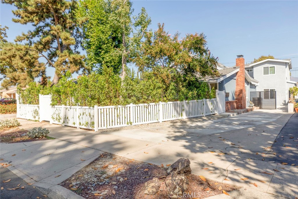 a view of a house with a street