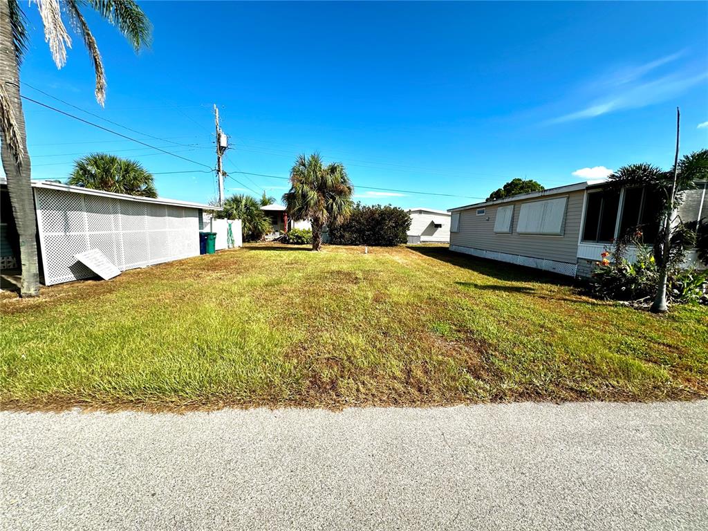 a view of a backyard of the house