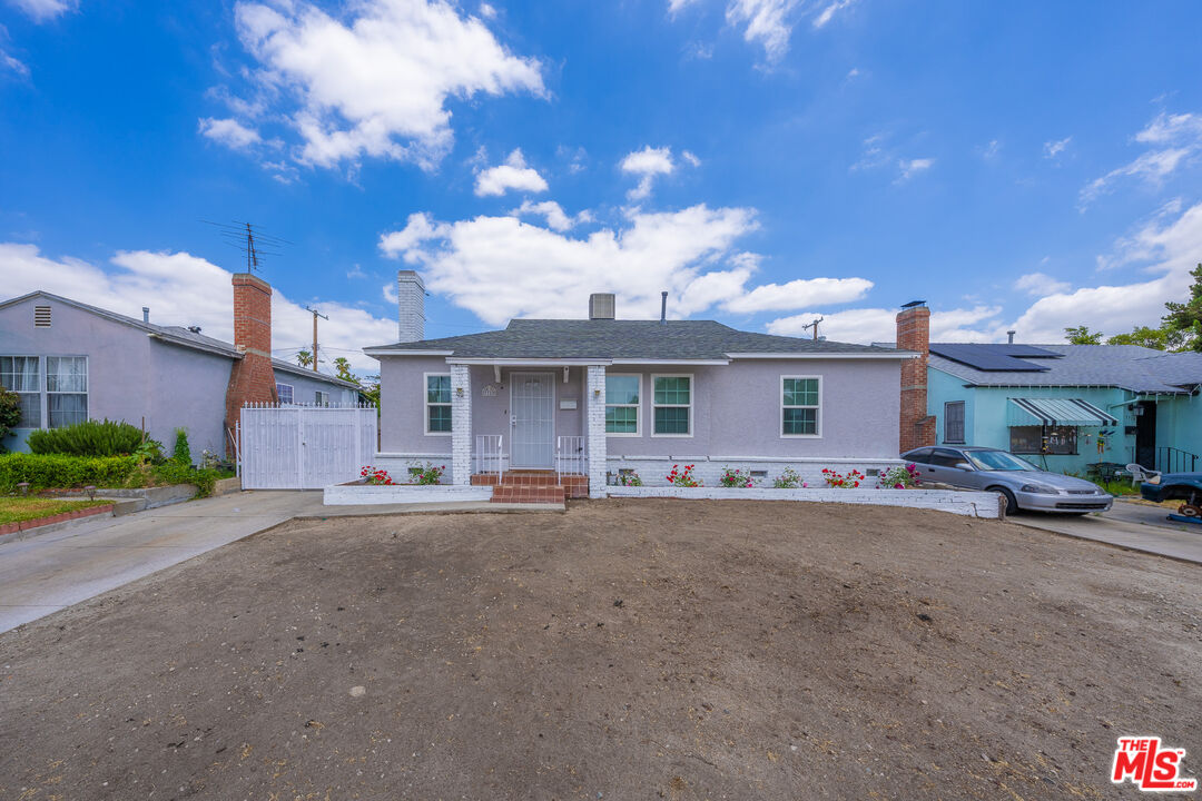 a view of a house with a patio