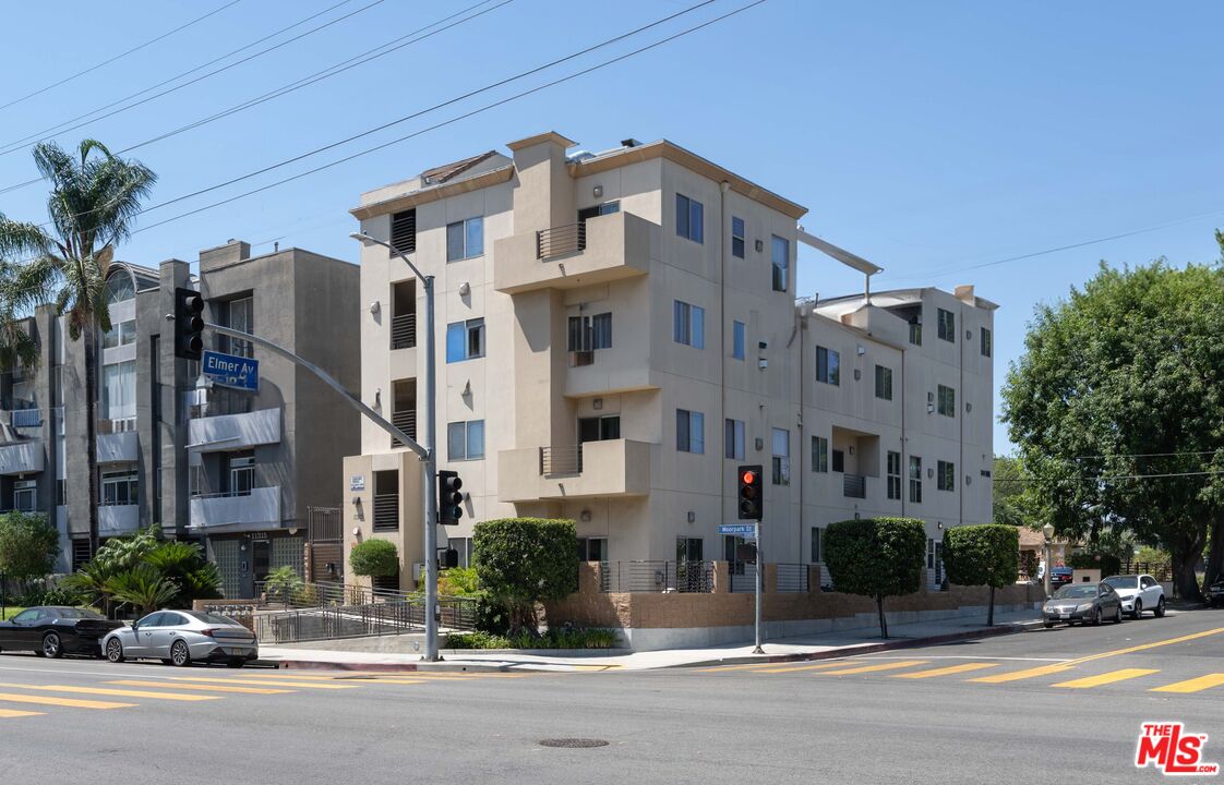 a front view of a building with street view