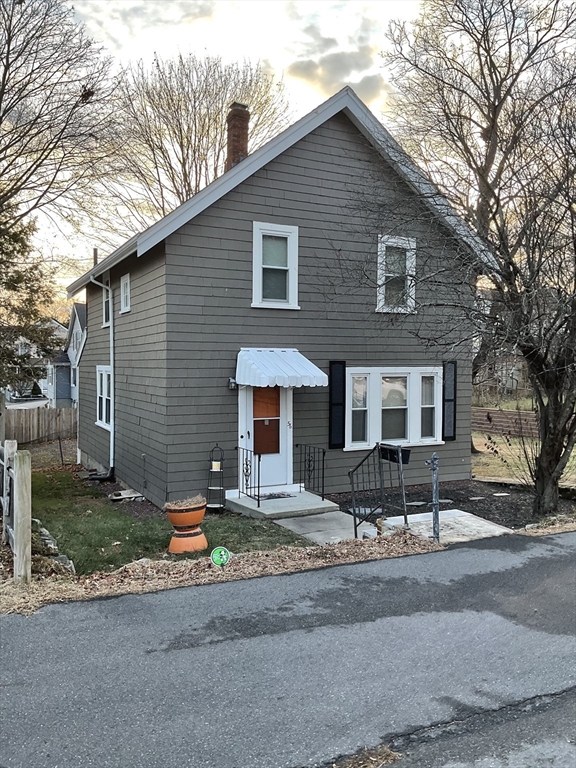 a front view of house with yard