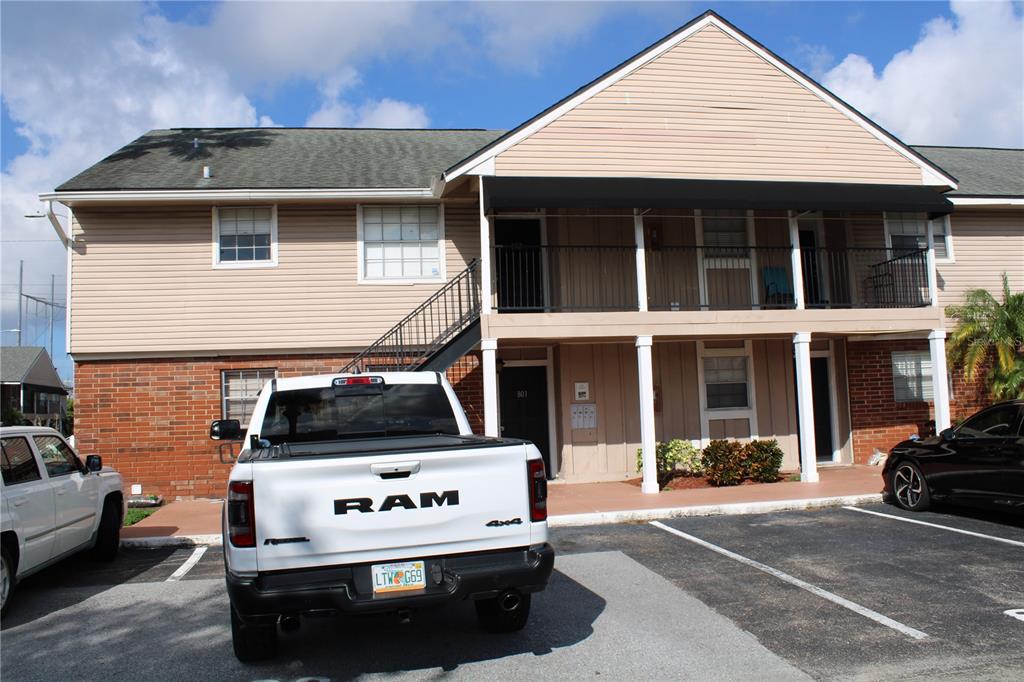 a view of a car park in front of house