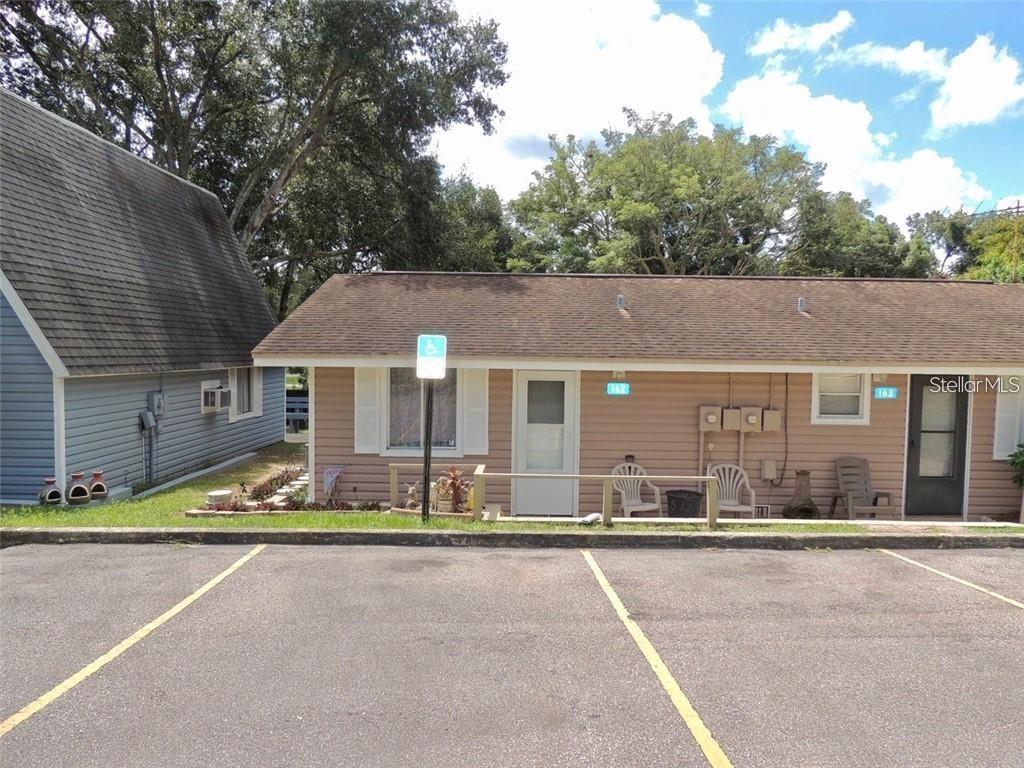 a view of a house with a street