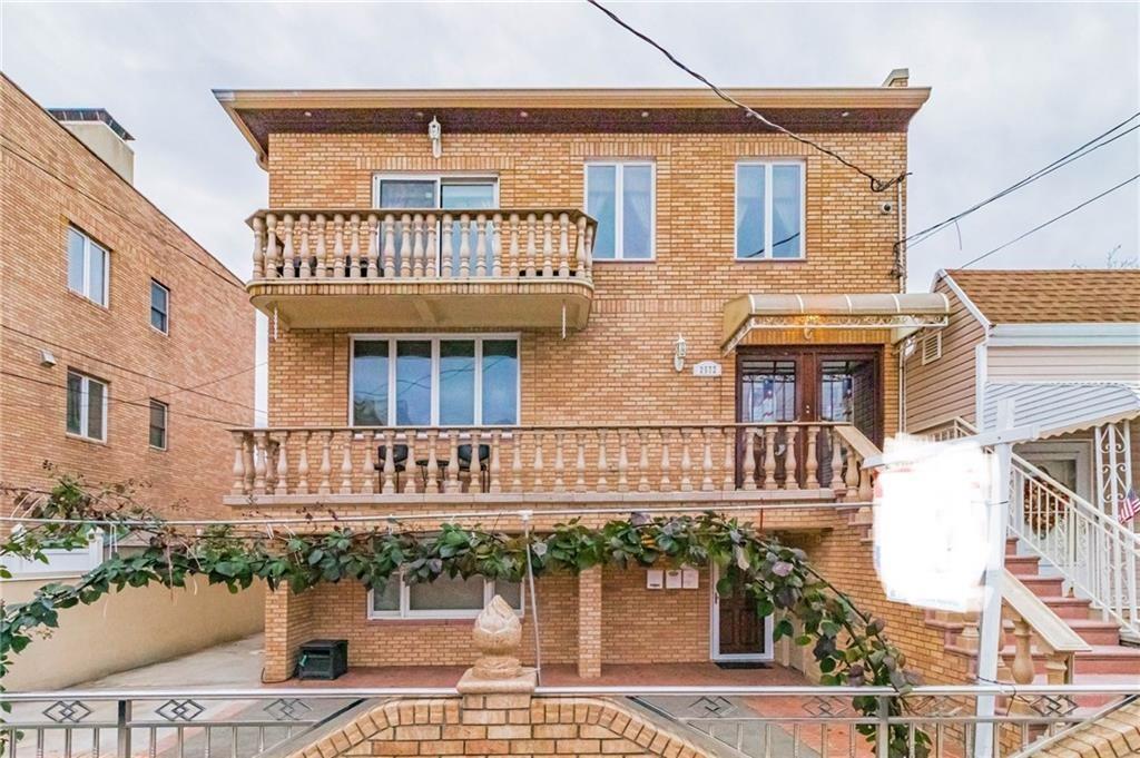 a front view of a house with a balcony