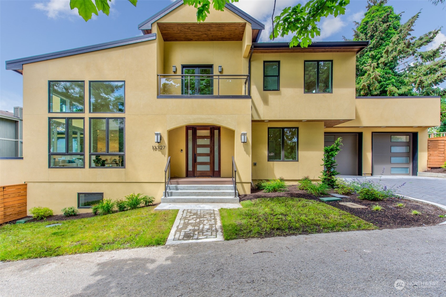 front view of a house with a yard