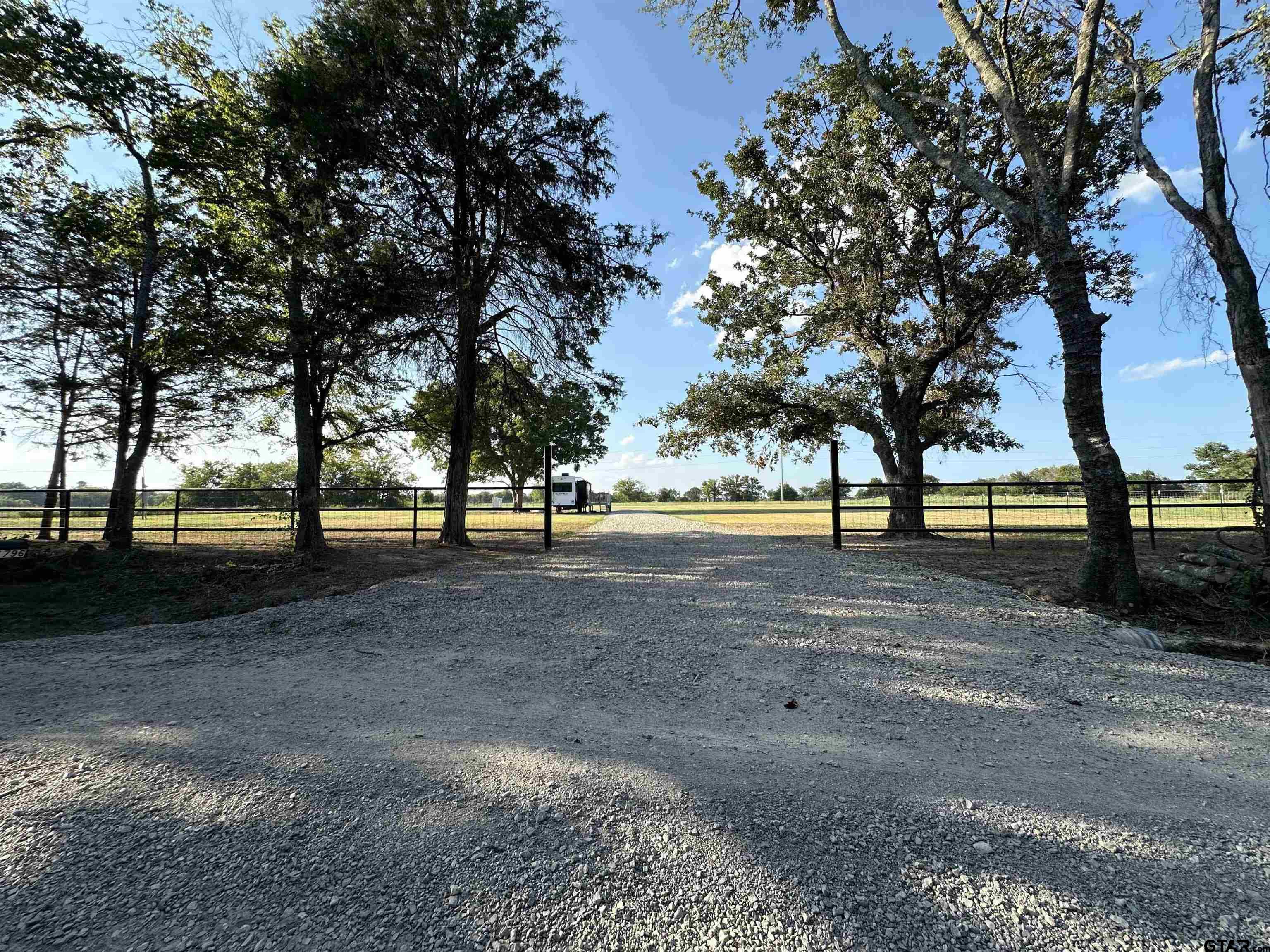 a view of outdoor space with lots of trees