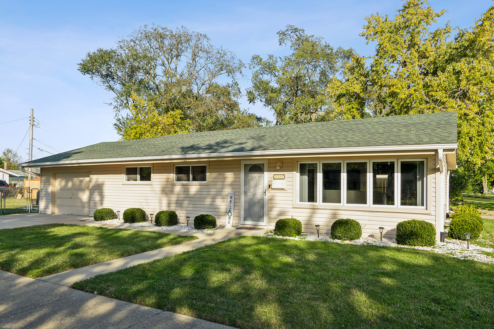 front view of a house with a yard