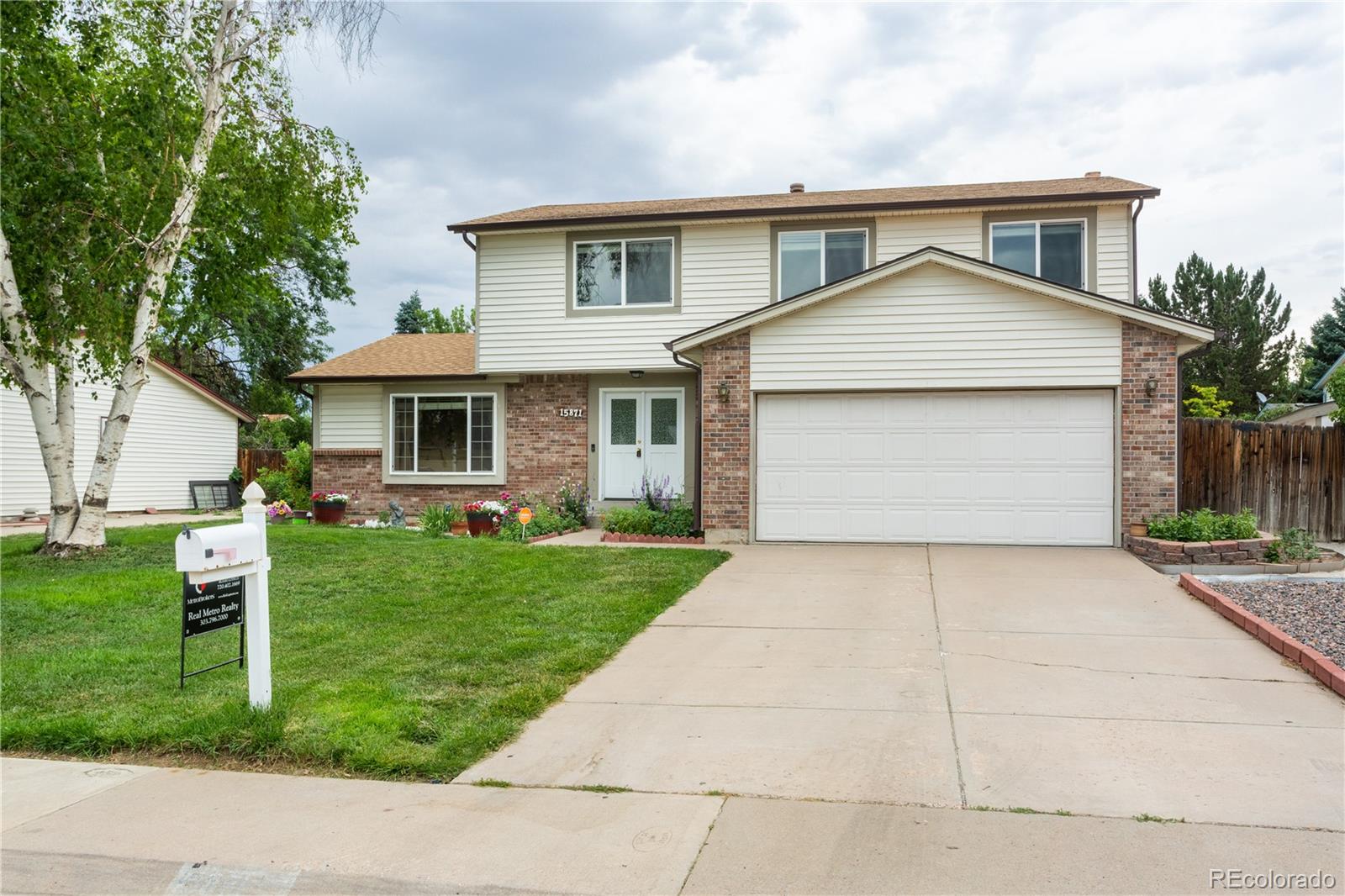 front view of house with a yard